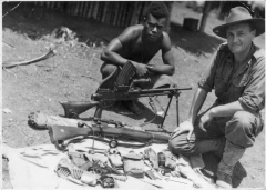 New Britain coast-watcher Lieutenant Joe Sampson and a native troop member